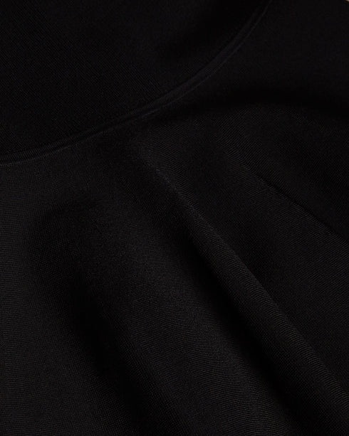 JUDIT-Dresses-JUDIT is the flower of the flock. This tulip dress is enhanced with a scooped neckline and an exposed zip on the back that adds a touch of extra drama to its sophisticated look. Take this dress from the office to the bar, and turn heads wherever you go. Mini dress Tulip skirt Compact knit Slight stretch Sleeveless Scoop neck Zip back Karolina is 5'10" / 1.78m and wears Black in a Ted size 1- Ted Baker Romania
